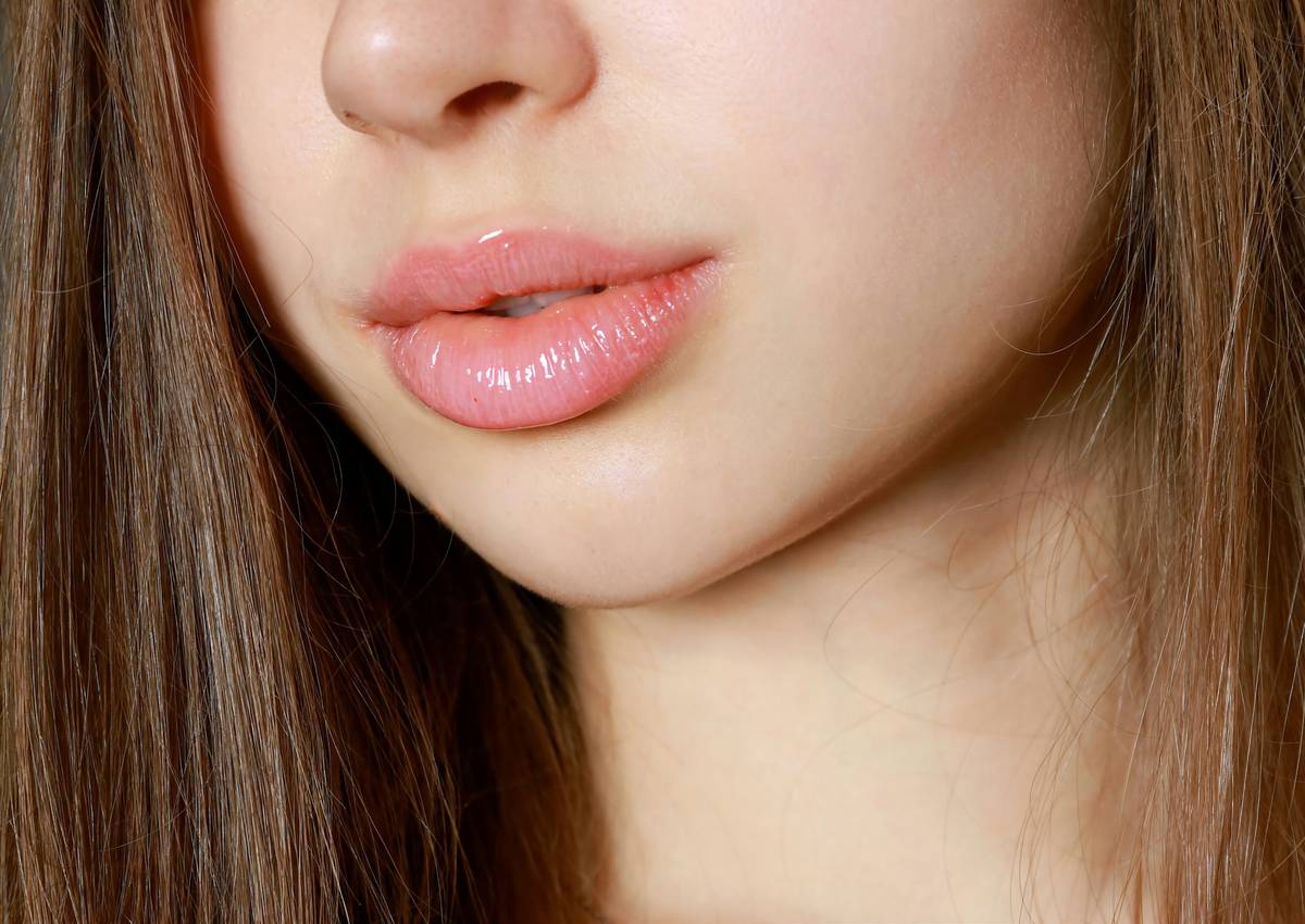 Side-by-side comparison: traditional lipstick smudging vs. lip crayon staying sharp after coffee sip